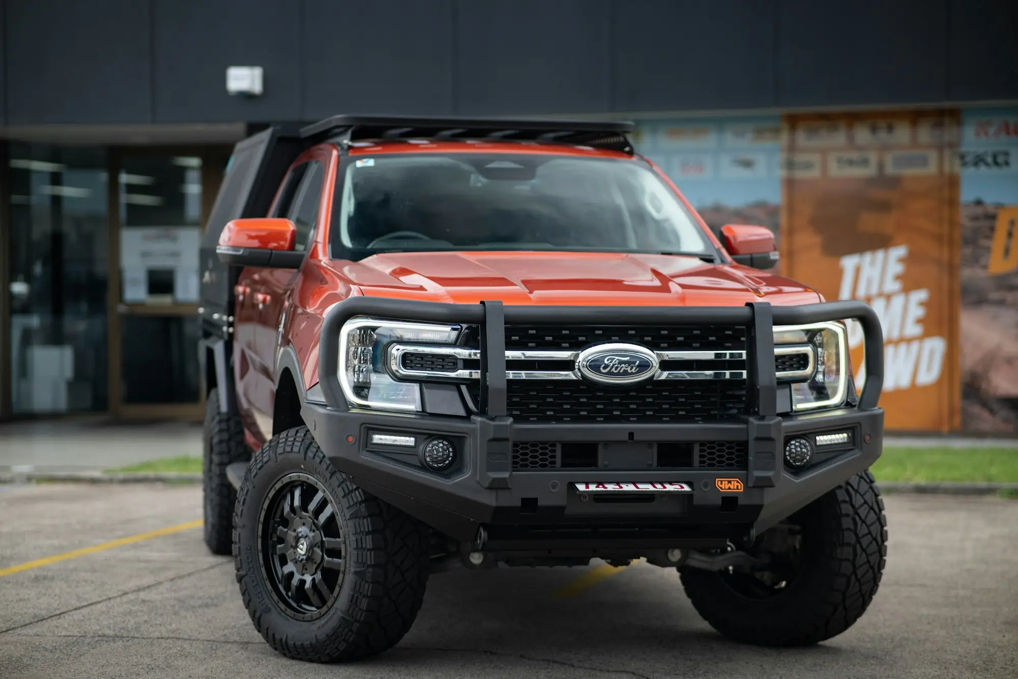 Four-wheel drive ute parked outside a workshop in Brisbane