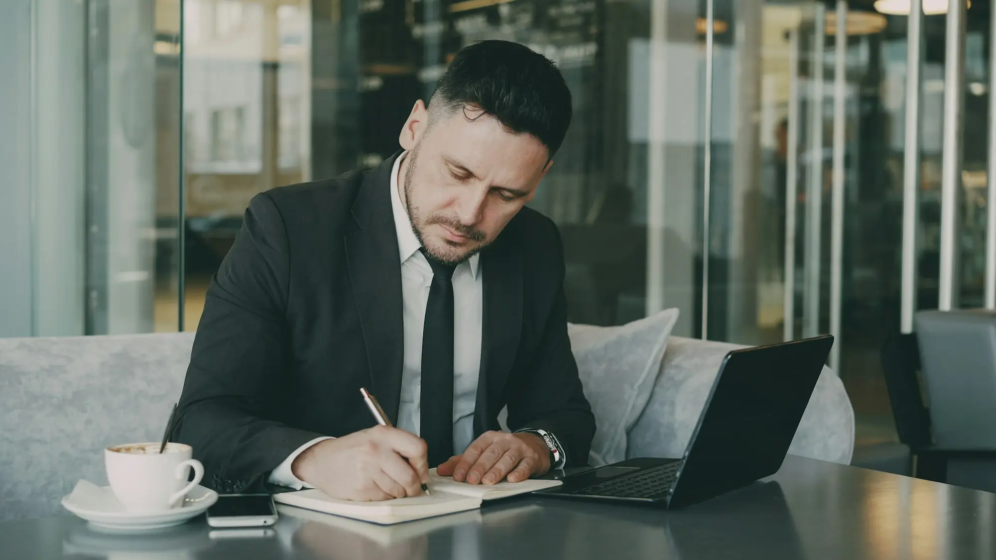Business owner reading guarantee documents before signing